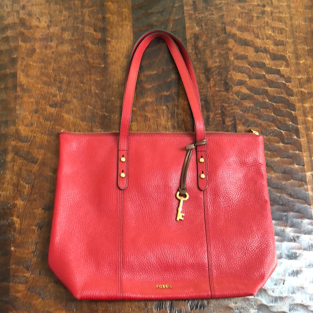 Authentic Fossil, in brand new condition, buttery leather red satchel.